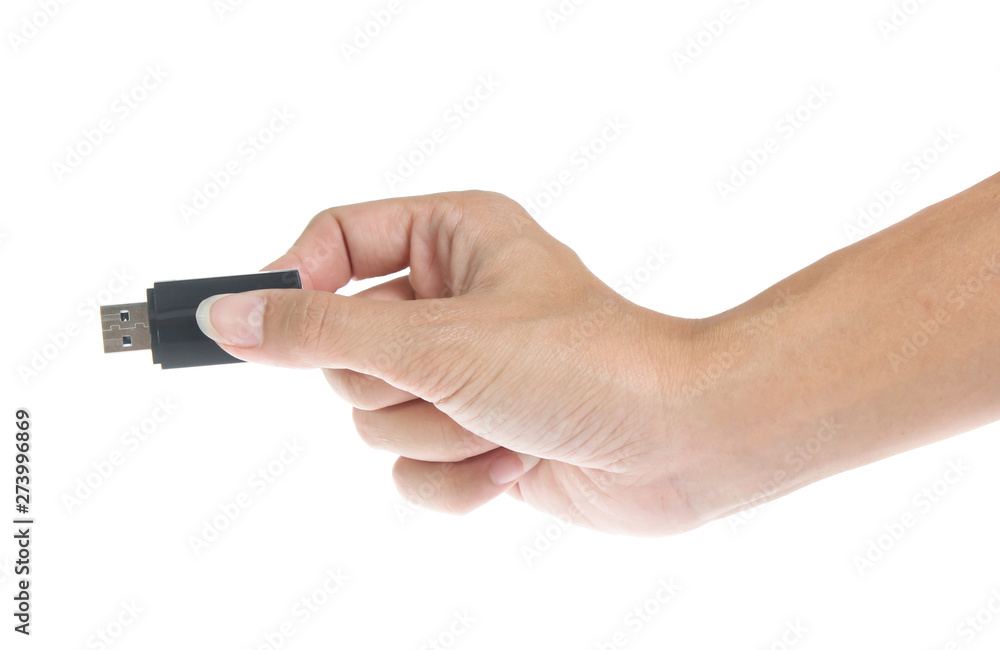 Flash drive in hand isolated on white background Flash drive in hand isolated on white background