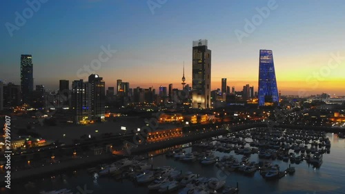 Kuwait, night panorama of the city. Beautiful aerial view at sunset. photo