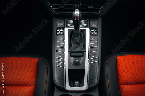 Modern expensive car interior and gearbox shift handle 