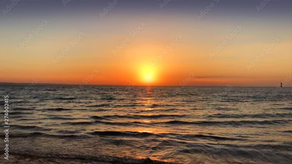 Intense red sunset at beach Intense red sunset at beach