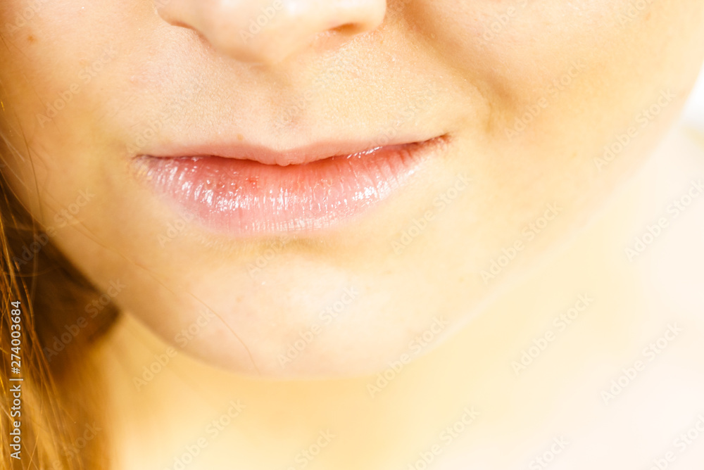 Obraz premium Girl with no makeup, part of face lips
