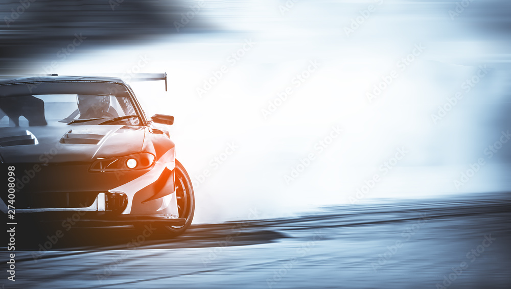 Car drifting, Blurred of image diffusion race drift car with lots of smoke  from burning tires on speed track Stock Photo | Adobe Stock