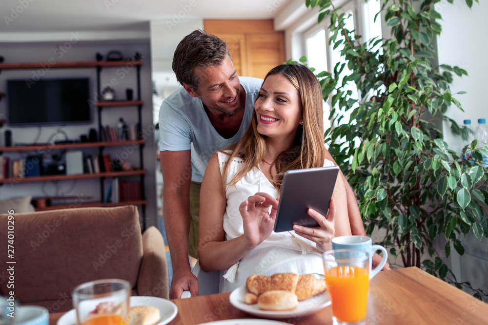 Couple having breakfast in their home Couple having breakfast in their home