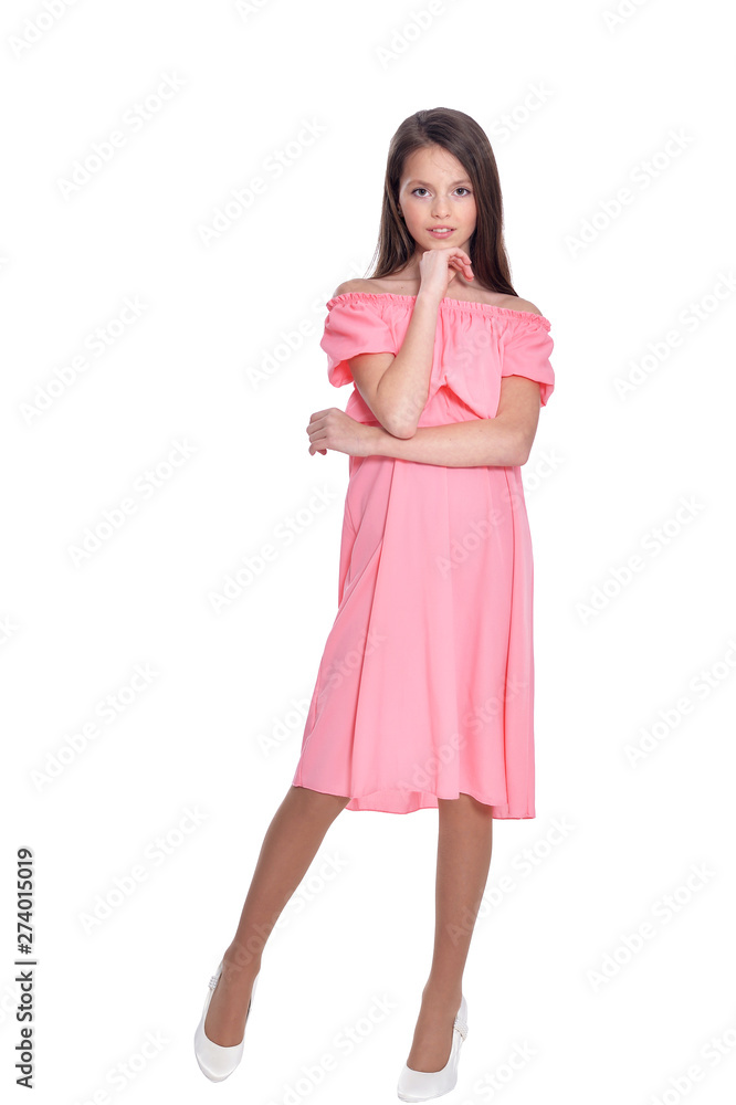 Happy little girl in dress posing on white background Happy little girl in dress posing on white background