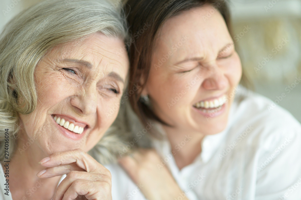 Portrait of Senior woman with daughter at home Portrait of Senior woman with daughter at home