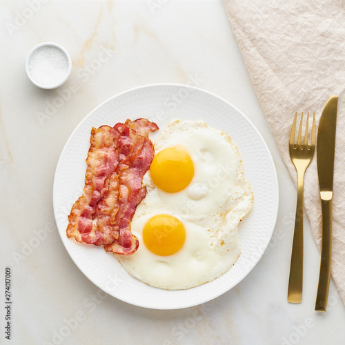 omelet with bacon top view foodmap ketogenic diet, pork background with salt and towel