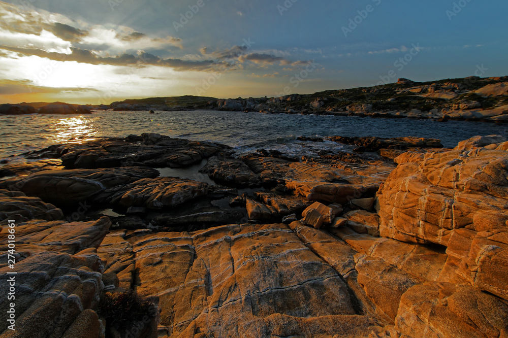 Punta di Spano in the Calvi gulf at sunset Punta di Spano in the Calvi gulf at sunset