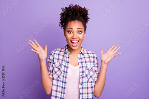 Portrait of her she nice charming cute attractive winsome lovable cheerful cheery optimistic wavy-haired girl in checked shirt showing excitement isolated over violet purple pastel background photo