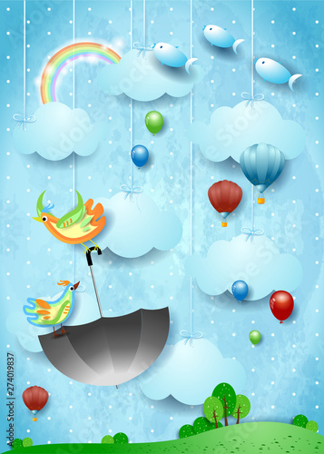 Surreal landscape with flying umbrella and fishes