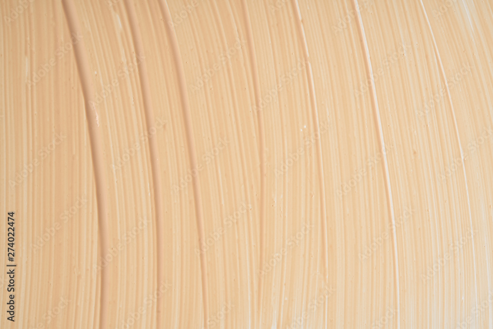 Gently beige strokes and texture of concealer Gently beige strokes and texture of concealer