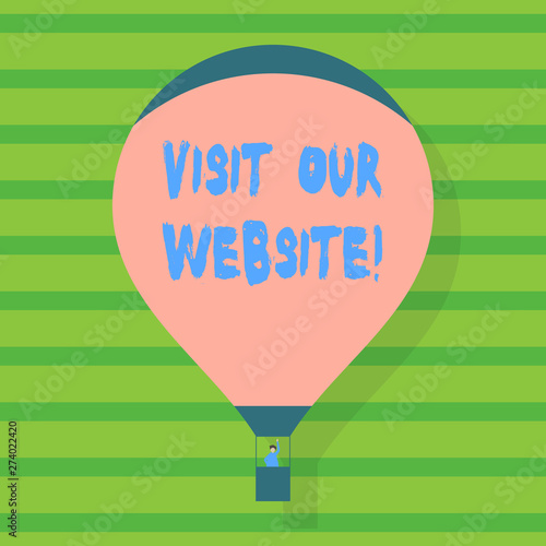 Conceptual hand writing showing Visit Our Website. Business photo showcasing visitor who arrives at web site and proceeds to browse Hot Air Balloon Floating with Passenger Waving From Gondola.