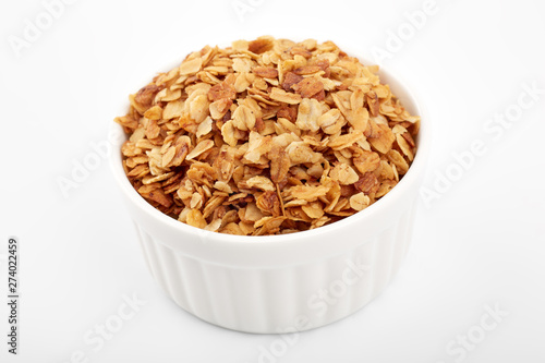 Organic homemade Granola Cereal with oats and almond. Texture oatmeal granola or muesli as background. Food concept. Healthy and wholesome food.