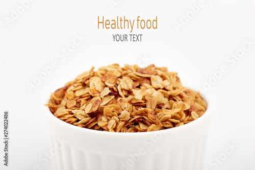 Organic homemade Granola Cereal with oats and almond. Texture oatmeal granola or muesli as background. Food concept. Healthy and wholesome food.