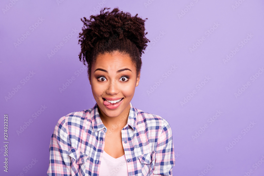 Close up photo of careless cute lovely teen teenager top-knot have free time holidays weekends foolish make faces enjoy rejoice dressed checked shirt isolated on purple background Close up photo of careless cute lovely teen teenager top-knot have free time holidays weekends foolish make faces enjoy rejoice dressed checked shirt isolated on purple background
