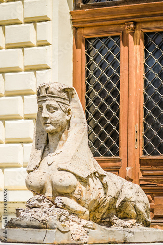 Sremski Karlovci, Serbia - June 12, 2019: Clerical High School in Sremski Karlovci Serbia. One of the two sculptures at the entrance to the gymnasium.