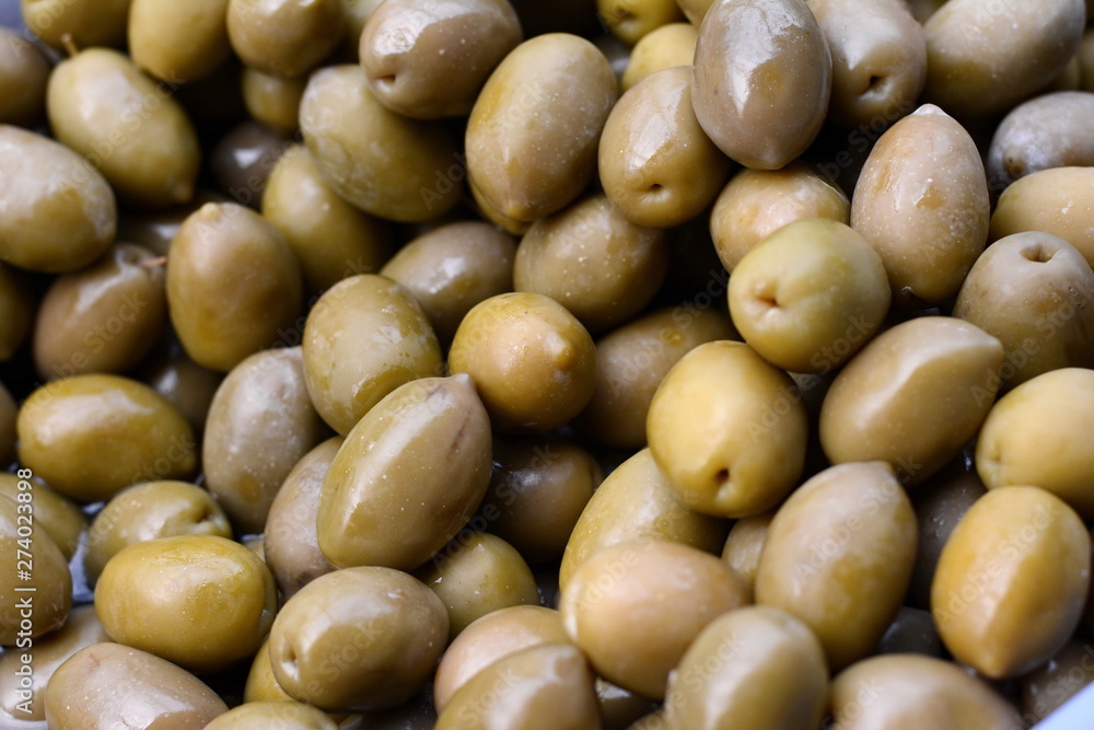 Background of olives close up. Healthy food background. Food concept. Background of olives close up. Healthy food background. Food concept.
