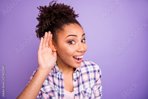 Close up photo astonished people youth hear confidential information impressed scandals excited open mouth scream wow omg unbelievable unexpected place hand palm plaid shirt isolated purple background photo