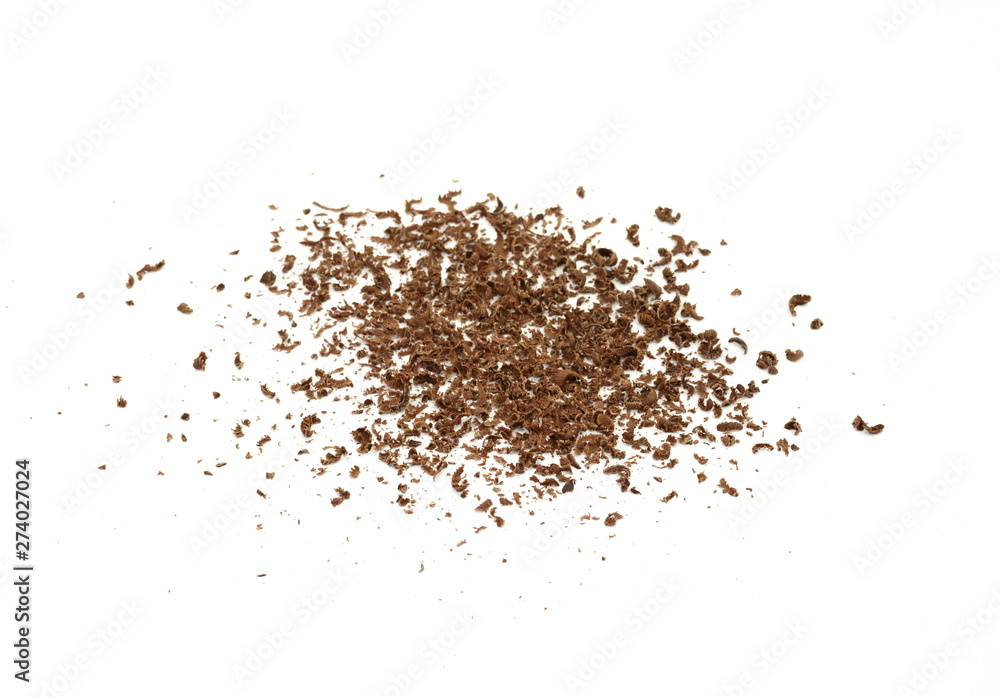 Grated chocolate. Heap of ground chocolate isolated on white background with clipping path, closeup. Grated chocolate. Heap of ground chocolate isolated on white background with clipping path, closeup.