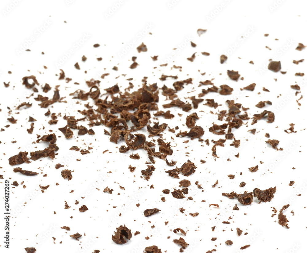 Grated chocolate. Heap of ground chocolate isolated on white background with clipping path, closeup. Grated chocolate. Heap of ground chocolate isolated on white background with clipping path, closeup.