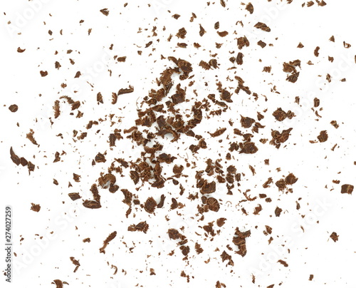 Grated chocolate. Heap of ground chocolate isolated on white background with clipping path  closeup.