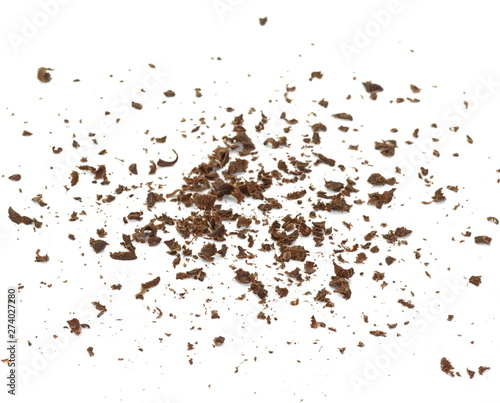 Grated chocolate. Heap of ground chocolate isolated on white background with clipping path, closeup.
