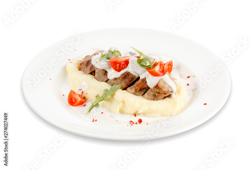 Mashed potatoes with meat and tomatoes