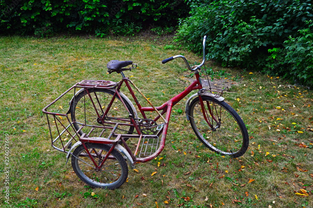 An old three-wheeled bicycle