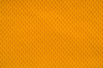 Orange color sports clothing fabric jersey football shirt texture top view