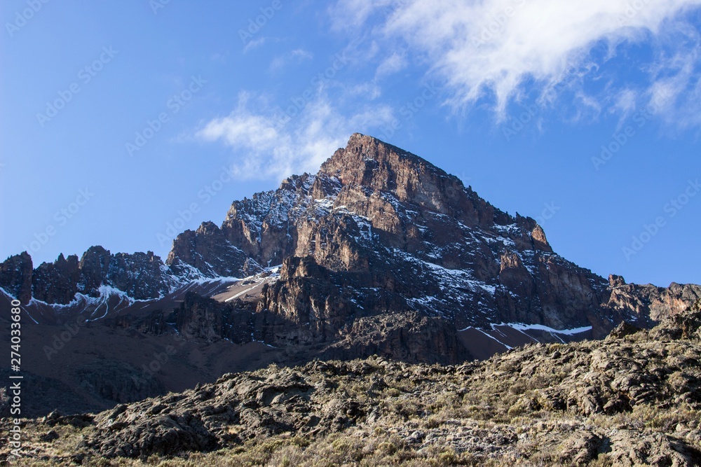Scenic landscape of Kilimanjaro mountain with rocky Mawenzi peak