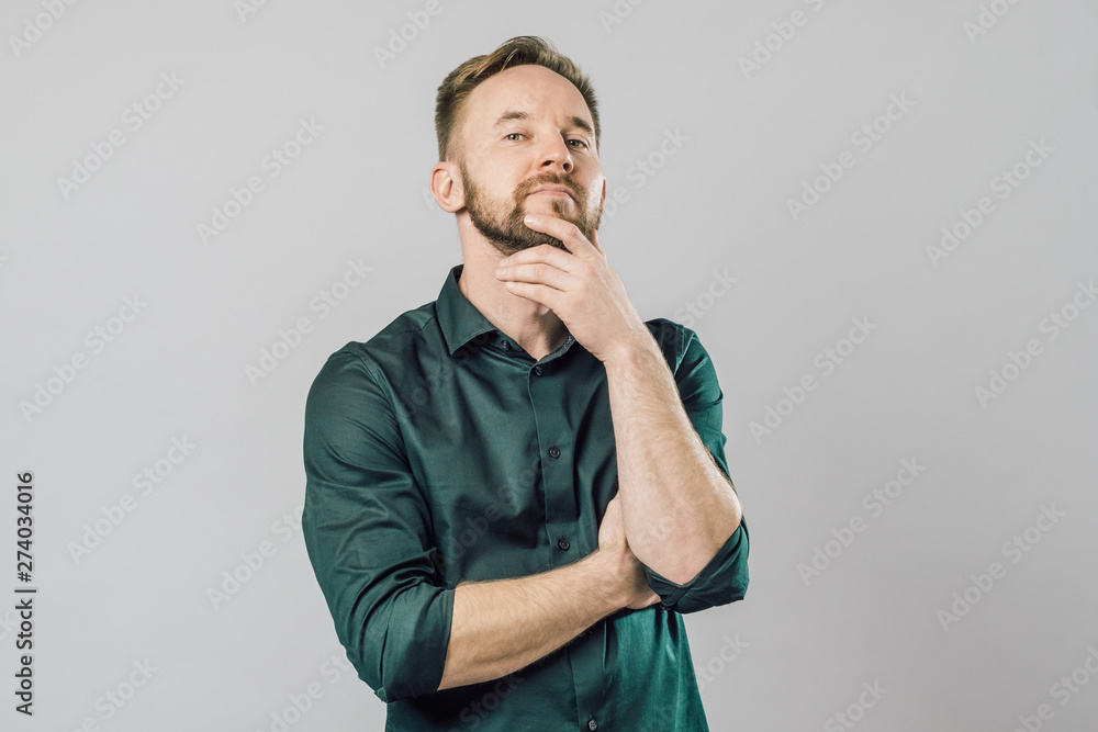 Portrait of focused smart with thoughtful determined expression Portrait of focused smart with thoughtful determined expression