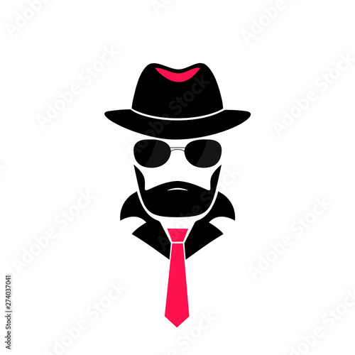 Bearded man in a hat and in sunglasses. Gentleman logo in mafia style for male store, a barber shop. Incognito. Spy