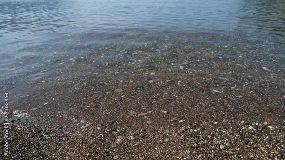 Fragment of Mediterranean Sea coast with a pebble beach Fragment of Mediterranean Sea coast with a pebble beach
