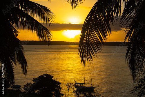 Dramatic sunset on the lake. Fall of the sun in Tibau do sul. Nature in the south of Natal.