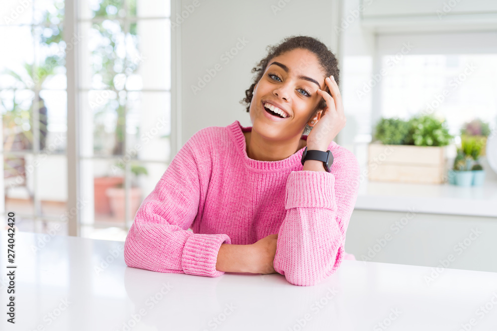 Beautiful young african american woman smiling cheerful, friendly face laughing confident Beautiful young african american woman smiling cheerful, friendly face laughing confident