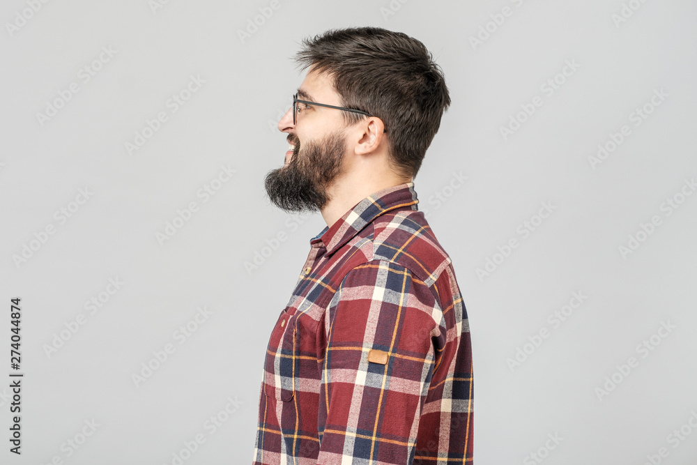 Side view of young bearded man isolated Side view of young bearded man isolated