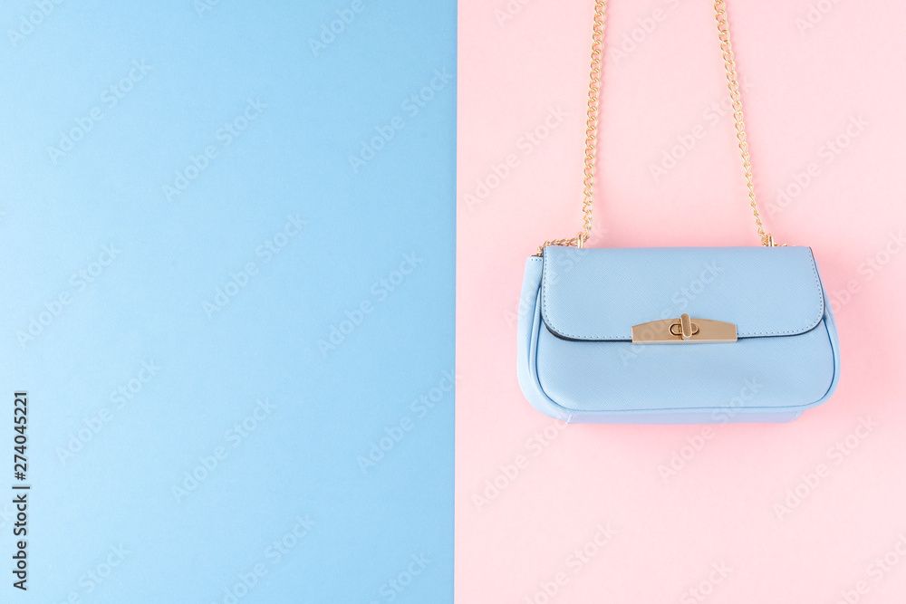 Blue purse on abstract background. Top view Blue purse on abstract background. Top view