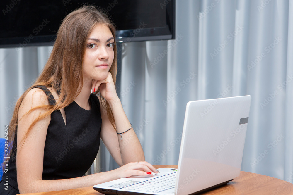 Happy Young Beautiful Woman Using Laptop, Indoors Happy Young Beautiful Woman Using Laptop, Indoors
