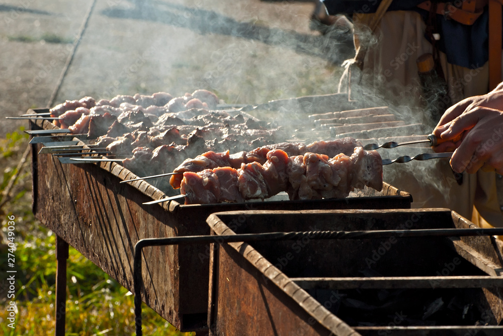 Slice pieces of meat on the grill. barbecue at the festival. Cheese and roasted veal on skewers. Slice pieces of meat on the grill. barbecue at the festival. Cheese and roasted veal on skewers.