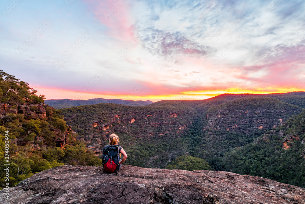 Fototapeta premium Woman in the mountain wilderness