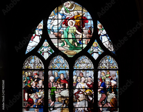 Salome Shows the Head of St. John the Baptist to Herod, stained glass window in Saint Severin church in Paris, France 