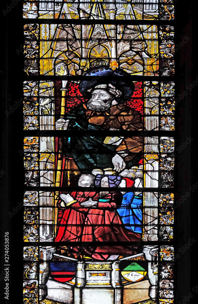 Saint Martin, stained glass window in Saint Severin church in Paris, France