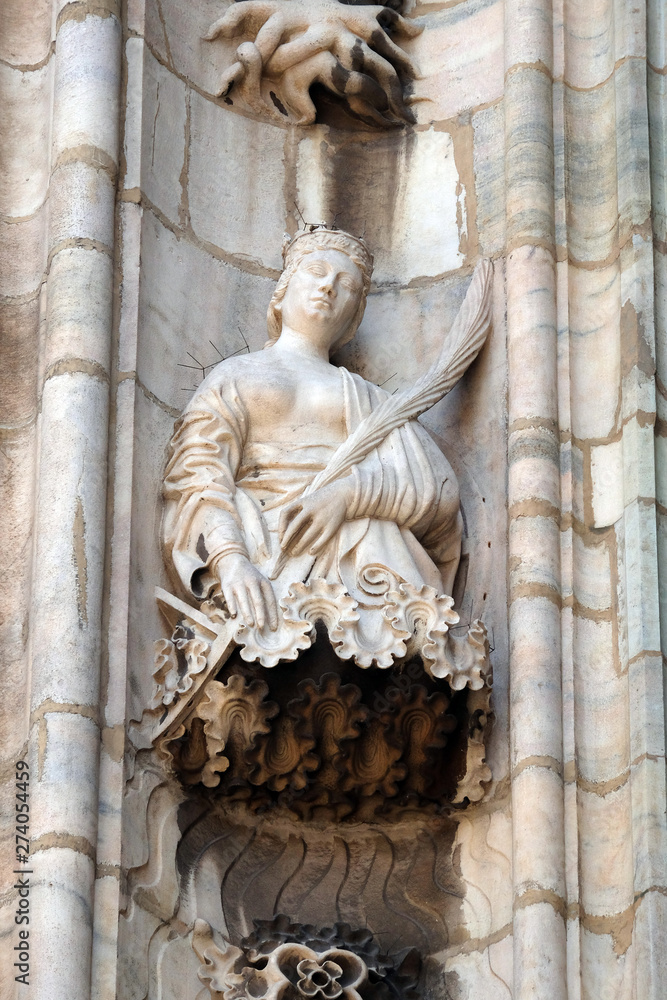 Obraz premium Statue of Saint on the facade of the Milan Cathedral, Duomo di Santa Maria Nascente, Milan, Lombardy, Italy