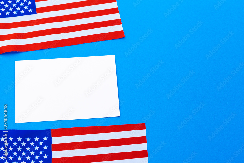 Obraz premium Blank business card with american flag