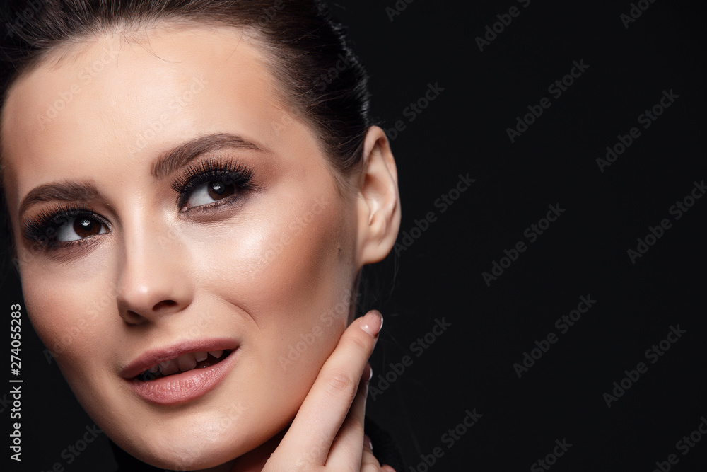 Fototapeta premium Eyelashes Makeup. Woman Beauty Face With Black Lashes Extensions