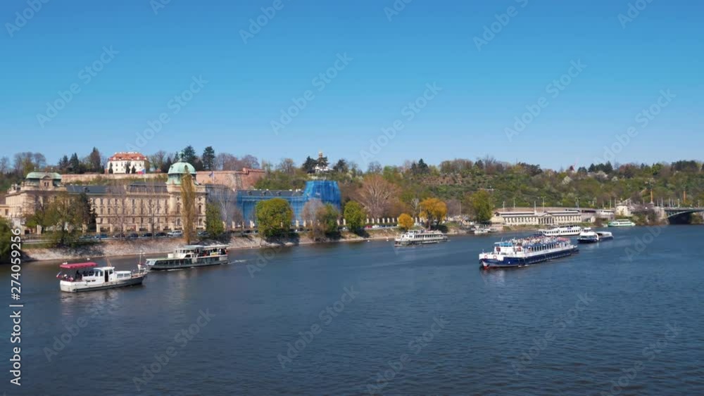Boats sailing on the river in Europe town Boats sailing on the river in Europe town