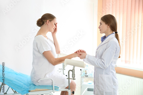 Sick woman visiting her gynecologist in clinic