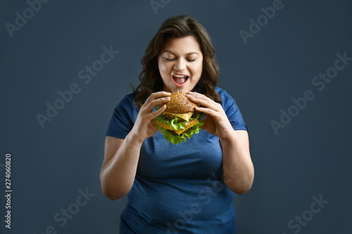 Plus size woman with tasty ...