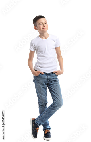 Stylish boy in jeans on white background