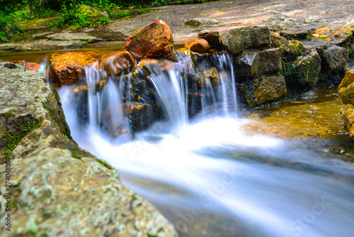 beautiful little waterfall at tropical forest