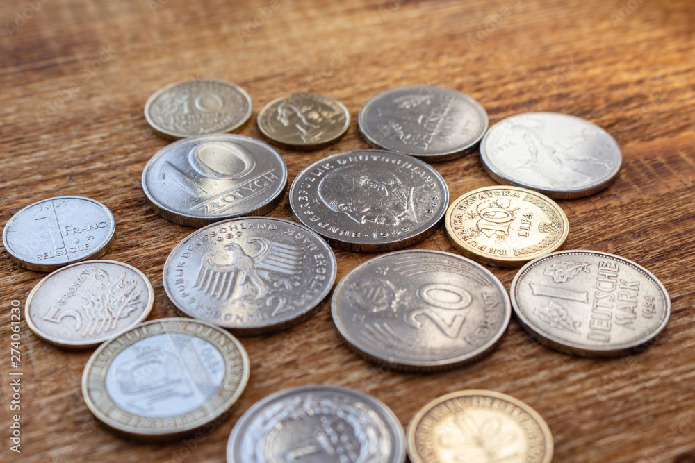 coins old before euro pile pack heap on a wooden background mock up selective focus close up coins old before euro pile pack heap on a wooden background mock up selective focus close up